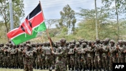 Wanajeshi wa Kenya wakihudhuria hafla iliyosimamiwa na rais wa Kenya William Ruto kabla ya kupelekwa nchini DRC kushiriki katika kikosi cha Afrika mashariki, Novemba 2, 2022.