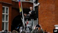 FILE - Wikileaks founder Julian Assange speaks on the balcony of the Ecuadorean Embassy in London, Feb. 5, 2016.