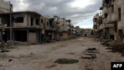 Permukiman di distrik Baba Amr, kota Homs mengalami kerusakan parah akibat peperangan (foto: dok). 