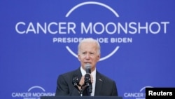 U.S. President Joe Biden delivers a speech on his "Cancer Moonshot" initiative at the John F. Kennedy Library and Museum in Boston, Massachusetts, Sept. 12, 2022. 