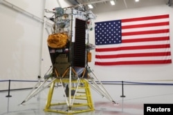 FILE - The Nova-C lunar lander designed by aerospace company Intuitive Machines is displayed at the company's headquarters in Houston, Texas, U.S., October 3, 2023. (REUTERS/Evan Garcia)