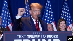 Republican presidential candidate former President Donald Trump speaks at a primary election night party at the South Carolina State Fairgrounds in Columbia, SC, Feb. 24, 2024. 