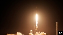A SpaceX Falcon 9 rocket lifts off from pad 39A at Kennedy Space Center in Cape Canaveral, Fla., Feb. 15, 2024. 