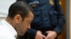 FILE - Brazilian soccer star Dani Alves sits during his trial in Barcelona, Spain, Feb. 5, 2024. Alves has been found guilty on Feb. 22, 2024 of sexually assaulting a young woman in a Barcelona nightclub.
