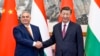 На оваа фотографија објавена од новинската агенција Xinhua, унгарскиот премиер Виктор Орбан се ракува со кинескиот претседател Шји Џјинпинг пред состанокот во Пекинг, 8 јули 2024 година