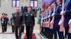 Russian Defense Minister Sergei Shoigu, left, and Chinese Defense Minister General Li Shangfu attend a ceremony in Moscow, April 18, 2023. (Russian Defense Ministry Press Service photo via AP)