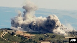 Smoke billows from the area of an Israeli air strike on the southern Lebanese village of Khiam near the border with Israel on March 23, 2024.