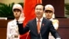 This picture taken and released by the Vietnam News Agency on March 2, 2023, shows Vietnam's new president, Vo Van Thuong, taking his oath during a National Assembly's meeting in Hanoi.
