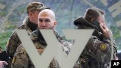ARCHIVES - L'entrée du "Centre PMC Wagner", affilié à Yevgeny Prigozhin, fondateur du groupe militaire privé Wagner, lors de la Journée de l'unité nationale, à Saint-Pétersbourg, en Russie, le 4 novembre 2022.
