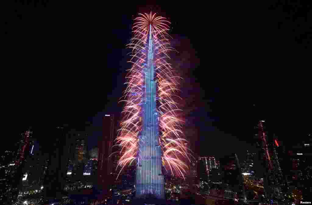 Fireworks explode from the Burj Khalifa, the tallest building in the world, during the New Year&#39;s celebrations in Dubai, United Arab Emirates, Jan. 1, 2024.