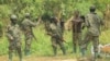 Wanajeshi wa vikosi vya jeshi la ulinzi Uganda (UPDF) wakifanya doria dhidi ya waasi wa ADF katika eneo la Mukakati. Picha na AFP