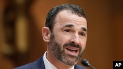 FILE - Daniel Werfel speaks during his confirmation hearing to be the Internal Revenue Service commissioner, in Washington, Feb. 15, 2023. The IRS said it is pursuing 1,600 millionaires and 75 business partnerships that owe millions in past due taxes. 
