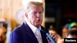 Donald Trump s'exprime pendant sa campagne à l'Iowa State Fair à Des Moines, dans l'Iowa, aux États-Unis, le 12 août 2023.