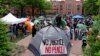 George Washington University students set tents in the campus during a pro-Palestinian protest against the Israel-Hamas war, April 25, 2024, in Washington.