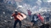 Death toll rises after landfill site collapses in Uganda's capital 