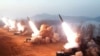 A general view of fire assault drill is seen at an undisclosed location in North Korea, in this photo released by North Korea's Korean Central News Agency.