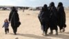 Canadian Woman Repatriated From Syria Charged With Terrorism 