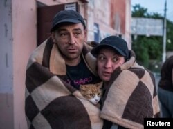 Evakuacija stanovnika iz poplavljenih područka poslije rušenja brane.