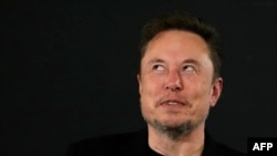 X (formerly Twitter) CEO Elon Musk gestures during an in-conversation event with Britain's Prime Minister Rishi Sunak in London on Nov. 2, 2023, following the UK Artificial Intelligence (AI) Safety Summit. 