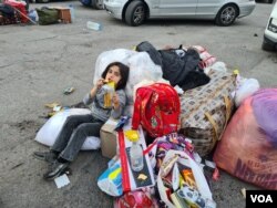 Families say for nine months their main supply route was closed, making food and other necessities scarce before they fled Nagorno-Karabakh, on Sept. 29, 2023, in Goris, Armenia. (Heather Murdock/VOA)