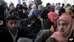Hundreds of Syrian families wait to register at the United Nations High Commissioner for Refugees (UNHCR) headquarters in Beirut, Lebanon, Jan. 30, 2017. 