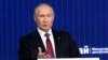Presiden Rusia Vladimir Putin berbicara dalam acara pertemuan tahunan Valdai International Discussion Club yang digelar di luar Kota Moskow, Rusia, pada 27 Oktober 2022. (Foto: Sergei Karpukhin, Sputnik, Kremlin Pool Photo via AP)
