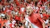 Suporter Indonesia meneriakkan yel-yel menjelang final kedua AFF Suzuki Cup 2010 di Jakarta pada 29 Desember 2010. Malaysia keluar sebagai juara AFF Suzuki Cup 2010. (Foto: AFP/Adek Berry)
