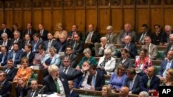  Britain's Prime Minister Boris Johnson speaks during Prime Minister's Questions in the House of Commons in London, July 13, 2022, as Conservative Party lawmakers cast ballots in the first round of an election to replace Prime Minister Boris Johnson. 