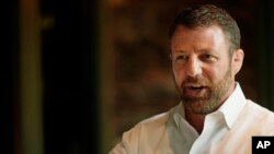 U.S. Senator-elect Markwayne Mullin of Oklahoma speaks to supporters in Norman, Oklahoma, Aug. 23, 2022.
