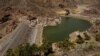 Aerial view of La Sorrueda reservoir in Santa Lucia de Tirajana at 10 percent of its capacity, in the island of Gran Canaria, Spain, Aug. 6, 2022. 