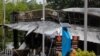 A shop is seen in an aftermath of an explosion which ripped through the southern Thailand province of Yala in what appeared to be multiple coordinated attacks in several locations, in Yala, Thailand, Aug. 17, 2022.