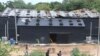 Exterior damage from a fire is seen at the Mountain B pub in the Sattahip district of Chonburi province, about 160 kilometers (100 miles) southeast of Bangkok. Over a dozen people were killed and dozens injured when a fire broke out early Friday morning a