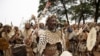 Les Amabutho (régiments zoulous) se rendent à la morgue pour recevoir le corps du roi Goodwill Zwelithini de Nongoma, KwaZulu Natal, le 17 mars 2021.