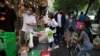 Beijing Shoppers Clear Store Shelves as District Starts Mass Testing 