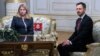 Slovakia's Prime Minister Eduard Heger, right, meets Slovakia's President Zuzana Caputova, after Parliament in a vote expressed no-confidence in his government at the Presidential Palace, in Bratislava, Dec. 15, 2022. (TASR via AP)
