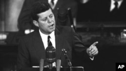 FILE - President John F. Kennedy speaks before a joint session of Congress in Washington, May 25, 1961.