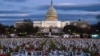 The US Capitol is seen behind a vigil honoring Iranians allegedly killed by their government during a rally in support of the ongoing protests in Iran at the National Mall in Washington, Dec. 17, 2022. 