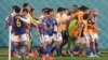 Japan players celebrate after Takuma Asano scored his side's second goal during the World Cup group E soccer match between Germany and Japan, at the Khalifa International Stadium in Doha, Qatar, Nov. 23, 2022. 