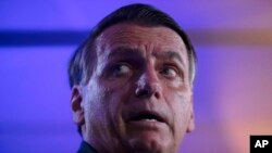 Mantan Presiden Brazil Jair Bolsonaro menghadiri konferensi pers di Rio de Janeiro, Brazil, pada 29 Oktober 2022. (Foto: AP/Bruna Brado)