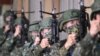 Tentara cadangan Taiwan mengikuti pelatihan militer di pangkalan militer di Taoyuan pada 12 Maret 2022. (Foto: AFP/Sam Yeh)