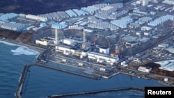 FILE - An aerial view shows the Fukushima Daiichi nuclear power plant following a strong earthquake, in Okuma town, Fukushima prefecture, Japan, in this photo taken by Kyodo on March 17, 2022. (Kyodo/via Reuters)