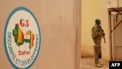 FILE - A Malian Army soldier with the G5 Sahel is seen in Sevare, May 30, 2018. Mali said May 15, 2022, it was withdrawing from a west African force fighting jihadists to protest its being rejected as head of the G5 regional group.