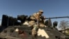 Tentara Ukraina mengendarai kendaraan lapis baja di Bakhmut wilayah Donetsk, Ukraina timur, 8 Mei 2022 (foto: dok). 