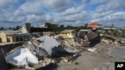 By Friday, Nov. 11, 2022, many beachfront homes and buildings in Wilbur-by-the-Sea, Florida, had collapsed because Hurricane Nicole had swept away the shoreline.