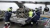 Radnici istovaruju pošiljku vojne pomoći u sklopu sigurnosne pomoći Sjedinjenih Američkih Država Ukrajini, u zračnoj luci Boryspil, Ukrajina, 11. februar 2022.