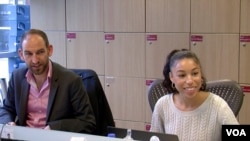 Rachel Priest, right, says discrimination exists, but not at her current job at Accenture. (L. Bryant/VOA)