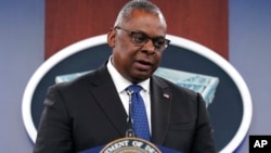 FILE - U.S. Defense Secretary Lloyd Austin speaks during a briefing at the Pentagon in Washington, Oct. 27, 2022.
