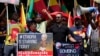 Members of the Tigrayan community protest against the conflict between Ethiopia and Tigray rebels in Ethiopia's Tigray region, outside the the United Arab Emirates embassy in Pretoria, South Africa, Oct. 12, 2022. 
