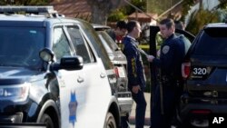 Police investigators work outside the home of Paul Pelosi, the husband of House Speaker Nancy Pelosi, in San Francisco, Oct. 28, 2022.