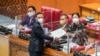 Ketua DPR Puan Maharani menerima laporan dari Willy Aditya, Ketua Panitia Kerja RUU Penanggulangan Kekerasan Seksual (TPKS), setelah disahkan oleh DPR RI, di Jakarta, Indonesia, 12 April 2022. (Antara Foto/ Galih Pradipta/ via REUTERS)